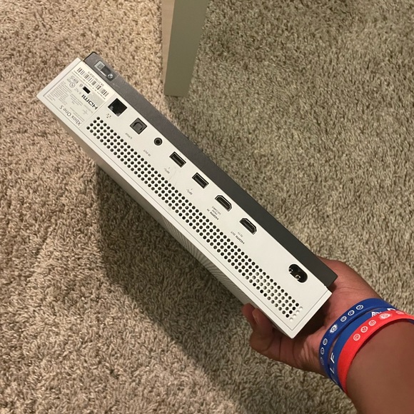 Xbox one including many games on it like Fortnite, 2k and madden 23, and more.
